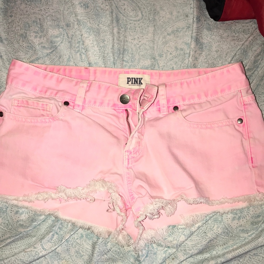 PINK denim shorts.
